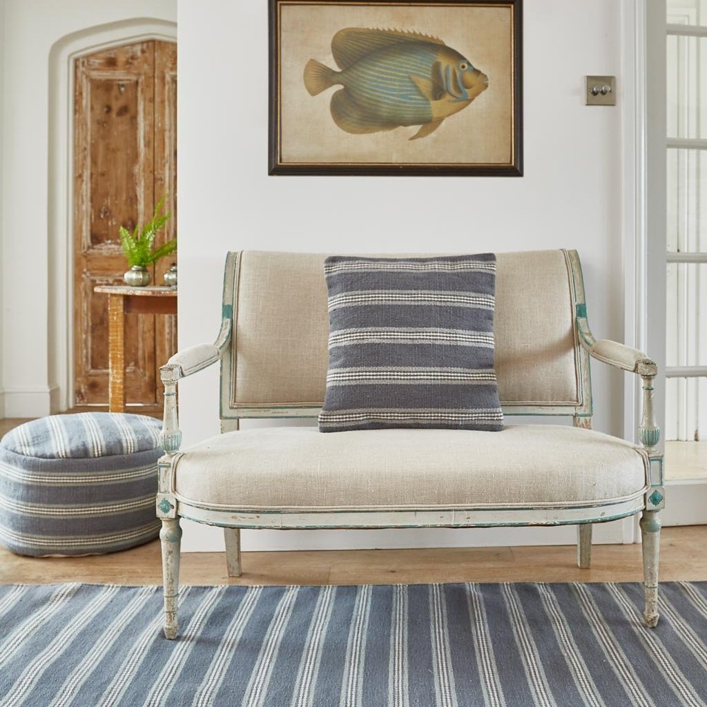 Clay Henley Stripe Cushion on bench seat with matching rug and footstool